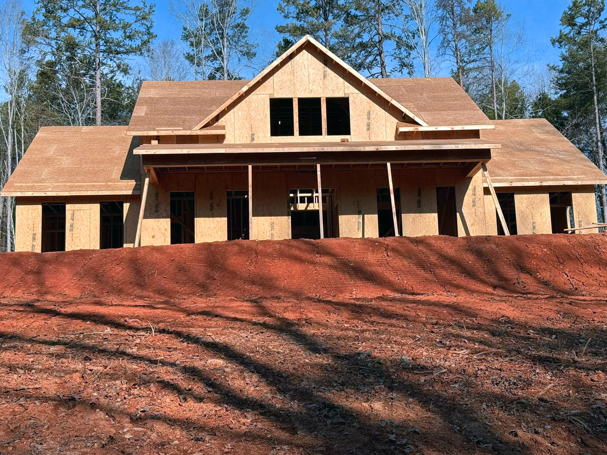Plan 041-00216 framing progress — Square Built Construction Services, licensed builder